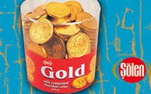 Monedas de chocolate por 150 unidades, cubiertas de papel oro.